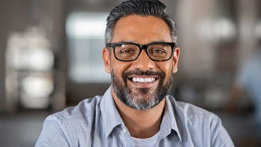 A patient smiling after restorative treatment.